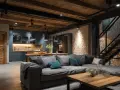 Un salon cosy avec un grand canapé gris, une cuisine moderne et un escalier industriel. Idéal pour aménager un souplex avec style.