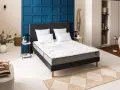 Un matelas Bultex, avec ses avantages de confort et ses inconvénients potentiels, est présenté dans une chambre moderne.