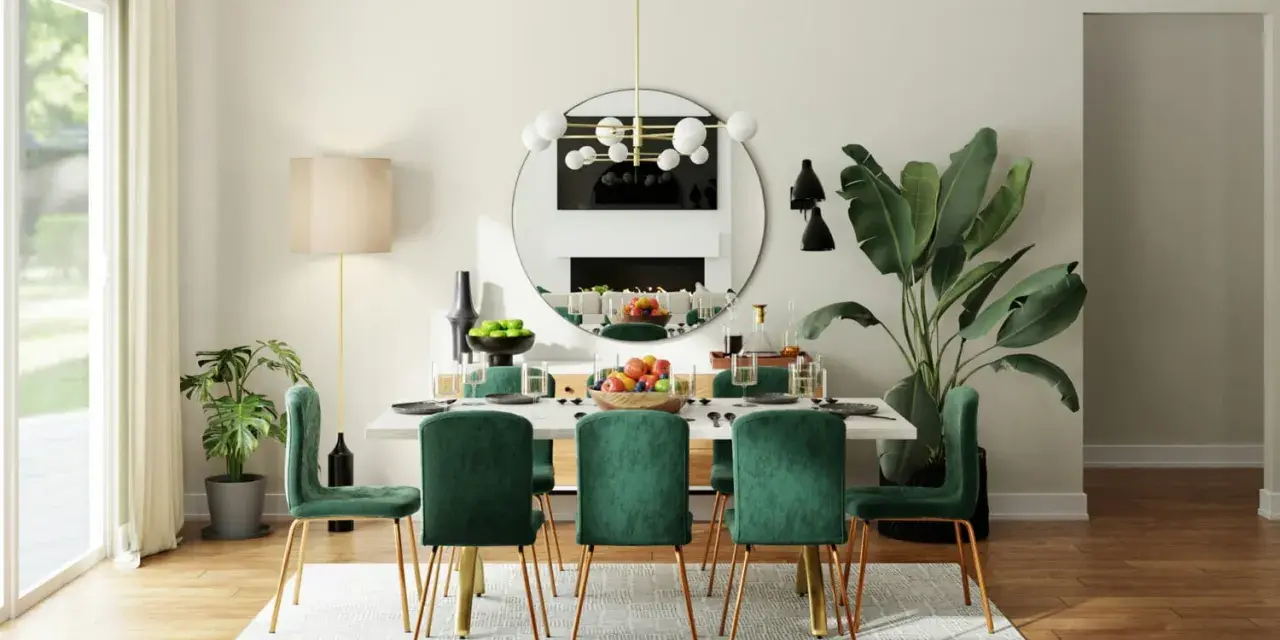 Une arche élégante sépare le salon de la salle à manger, révélant une table dressée avec des chaises en velours vert émeraude.