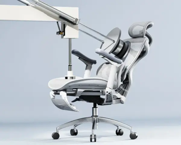 Fauteuil ergonomique médecine du travail, au design futuriste, avec repose-pieds déployé et appui-tête réglable.