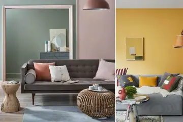 Canapé gris avec coussins aux couleurs variées, dont un coussin corail et un blanc cassé. Ambiance cosy et moderne.